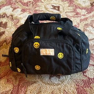 Lettia smiley face helmet bag